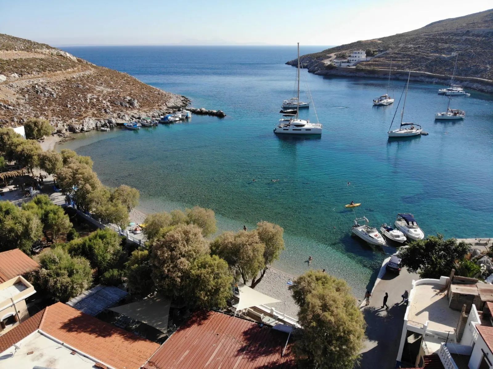 Aerial view of the bay of Vlychadia, Kalymnos, with its clear shallow water and pebble beach